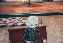 AI, 나만의 건강 코치로…일상 속 똑똑하게 건강 챙기는 법 black and white robot toy on red wooden table